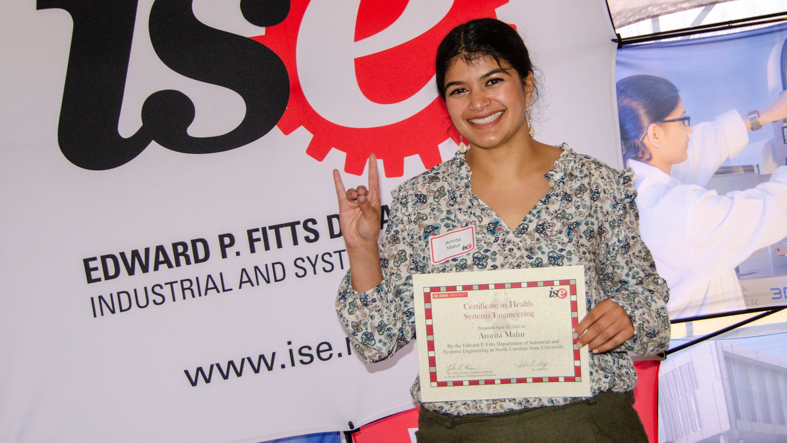 Amrita Malur receiving her Healthcare Systems Engineering Certificate at the 2022 C.A. Anderson Awards