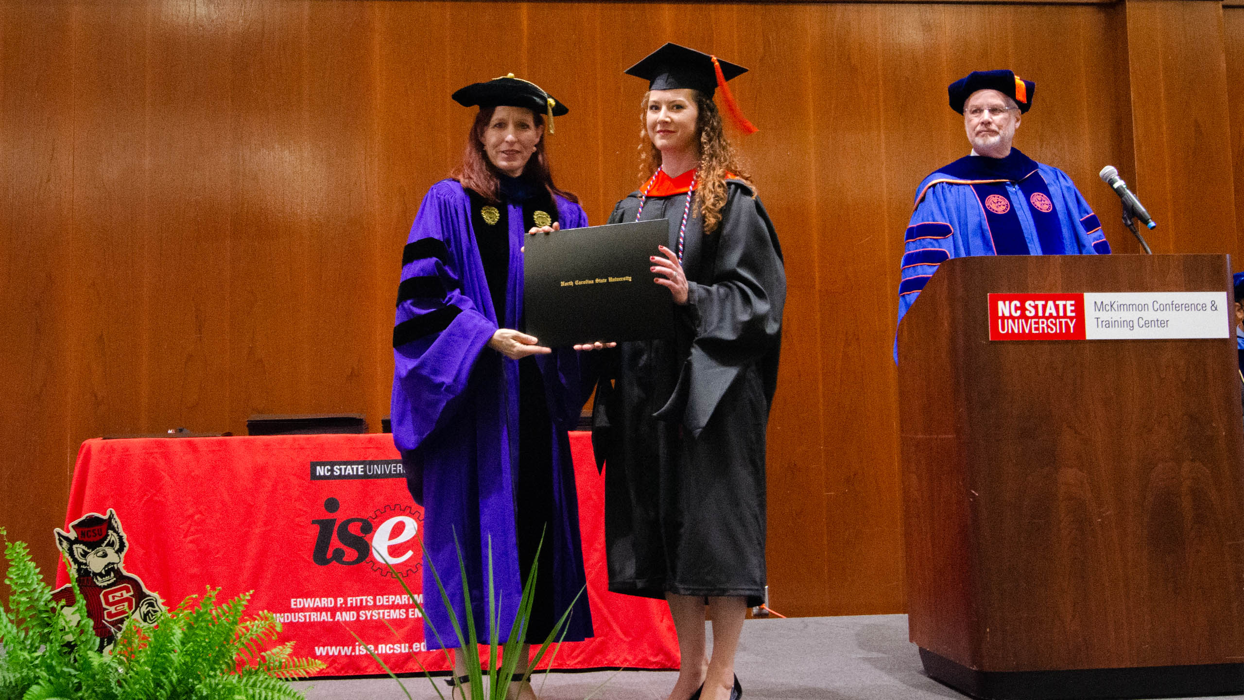Alexandra (Rader) Gardner receiving her diploma at the Spring 2022 Graduation