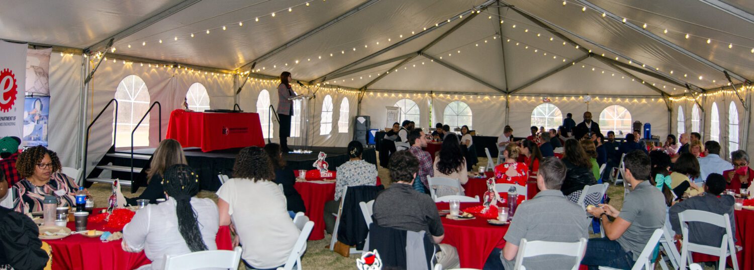 A tent full of people at the 2022 C.A. Anderson Awards