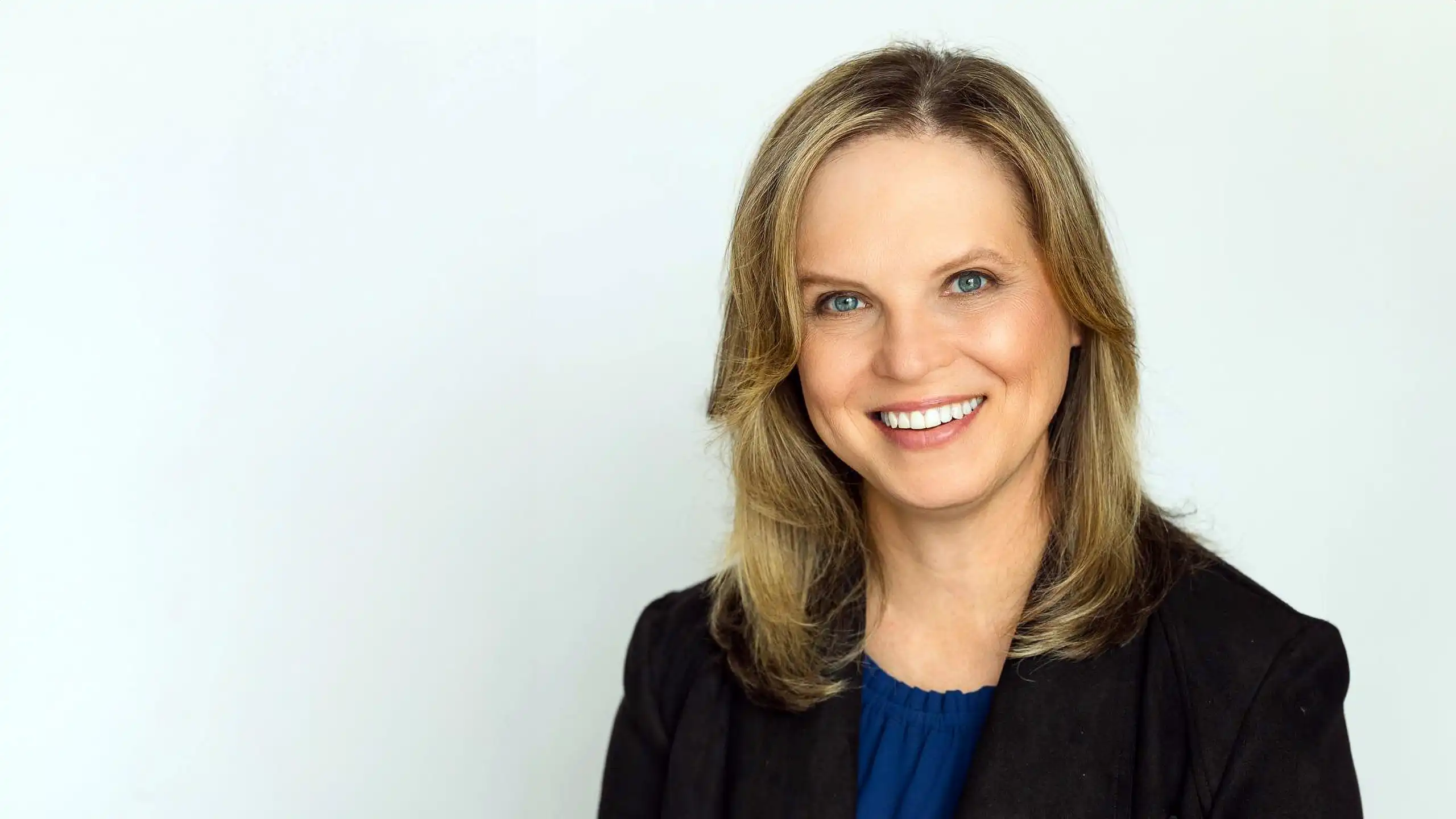 A headshot of Kim Lanza-Russo in front of a white background.