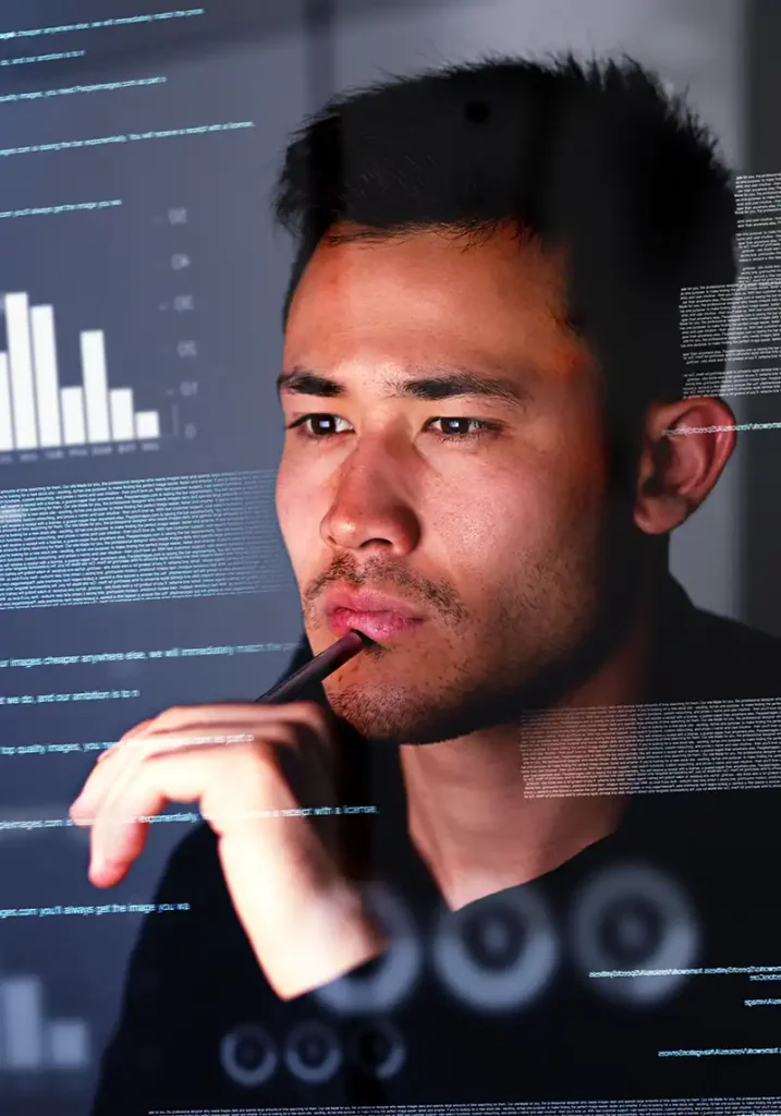 A student working on an analytics project as part of their master of Engineering Management degree at NC State University.