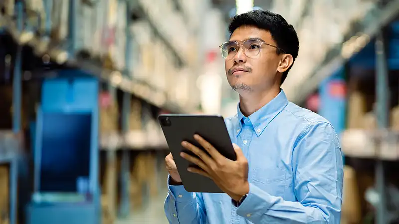 A student working on a supply chain engineering and management issue as part of his Master of Engineering Management degree at NC State University.