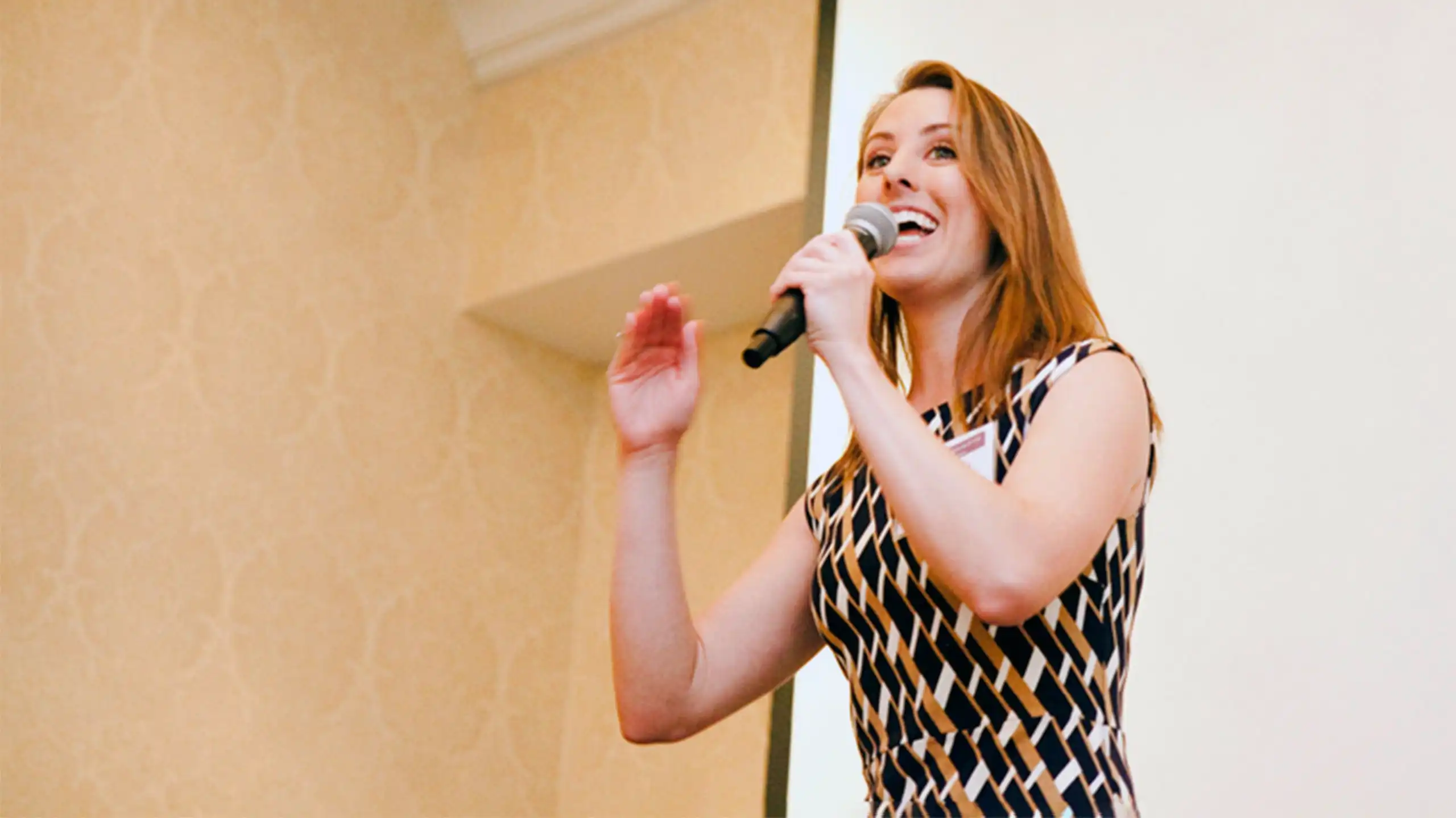 A female Seminar Series speaker discussing with the students how to build a personal brand.