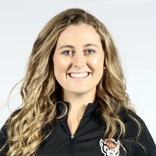 A headshot of MEMbassador Jaclyn Kenzel standing in front of a white background.