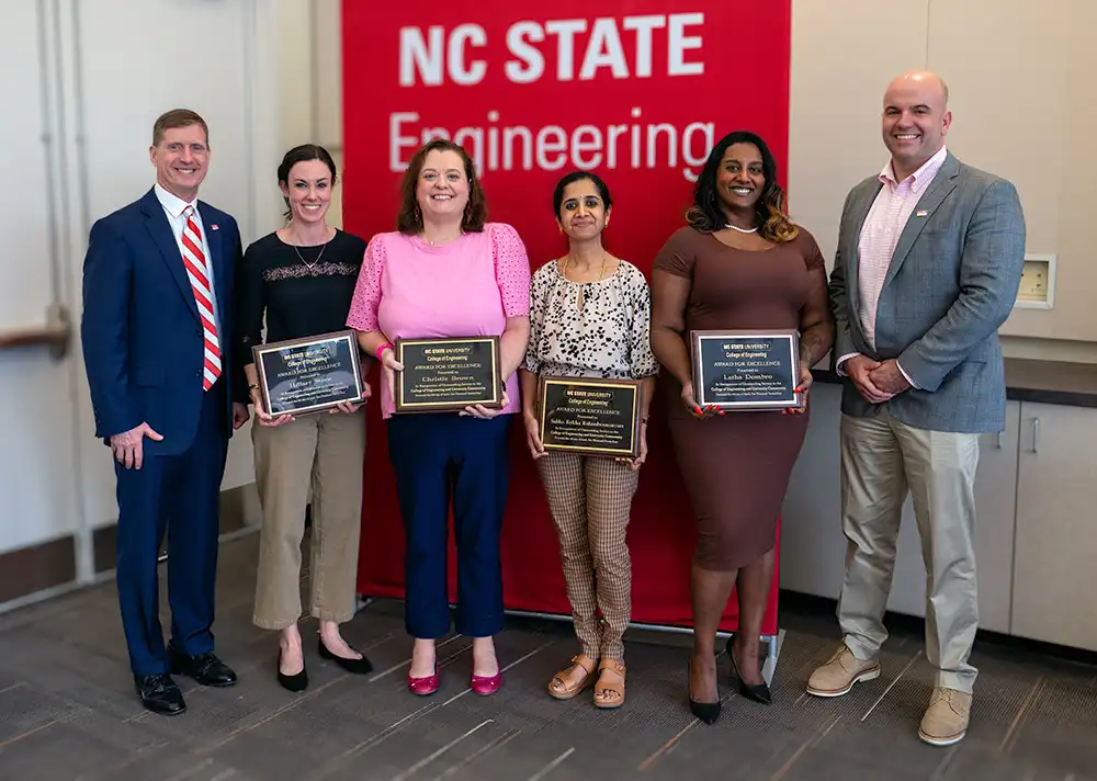 The recipients of the COE Awards for Excellence with the Dean and Assistant Dean of COE.