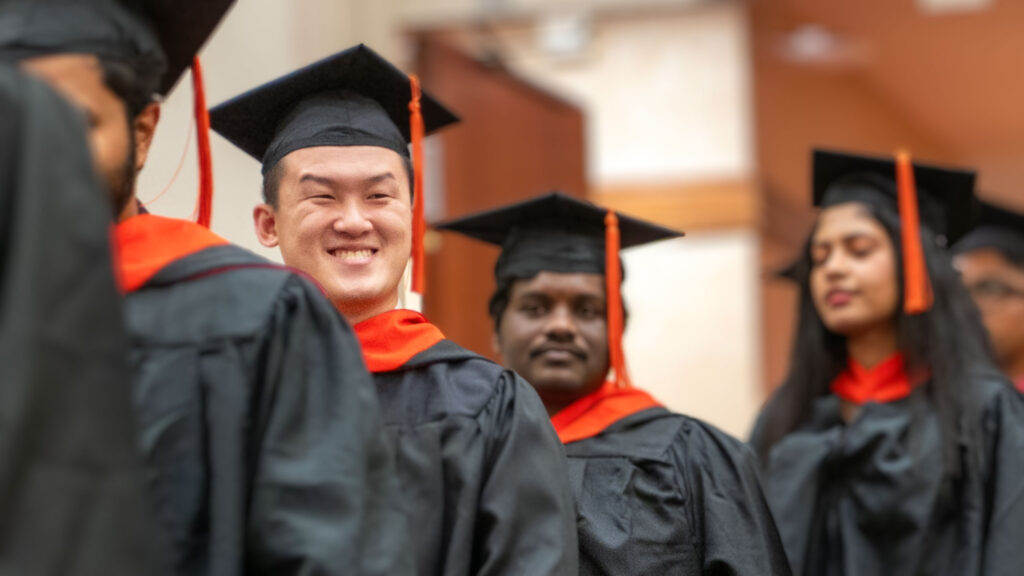 Students walking into the commencement ceremony.