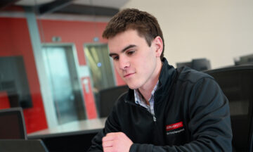 Paul Witmer, ABM Program's first student, studies in front of a computer.
