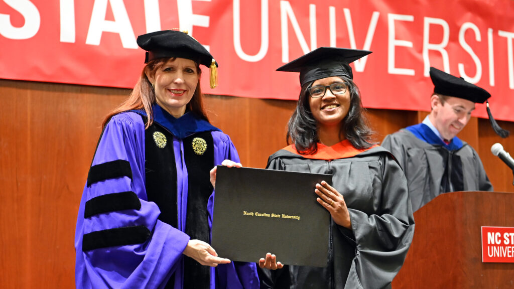 Goldan Azhagappaselvan poses with Julie Swann and her degree