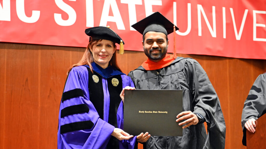 Pavankumar Balekundri poses with Julie Swann and his degree