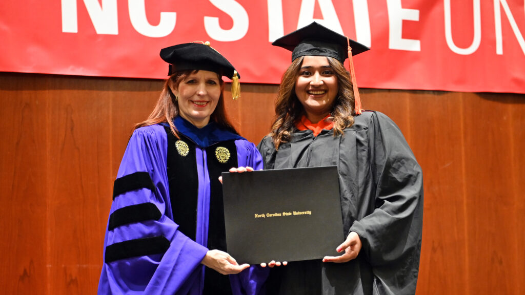 Vidhi Bhanushali receives her degree from Julie Swann