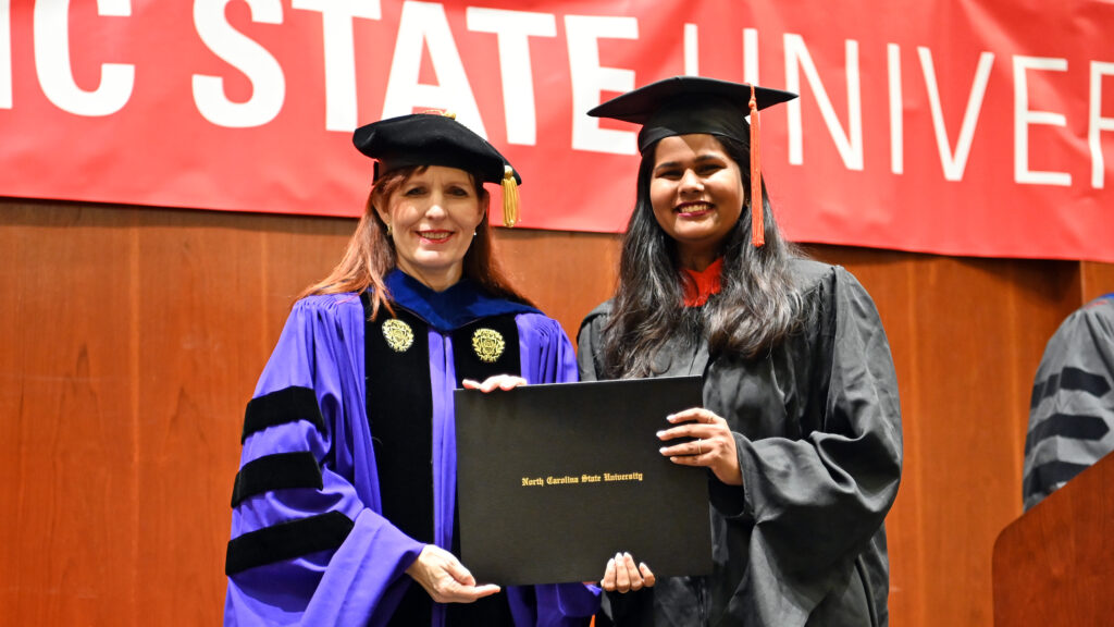 Naisargi Doshi poses with Julie Swann and her degree
