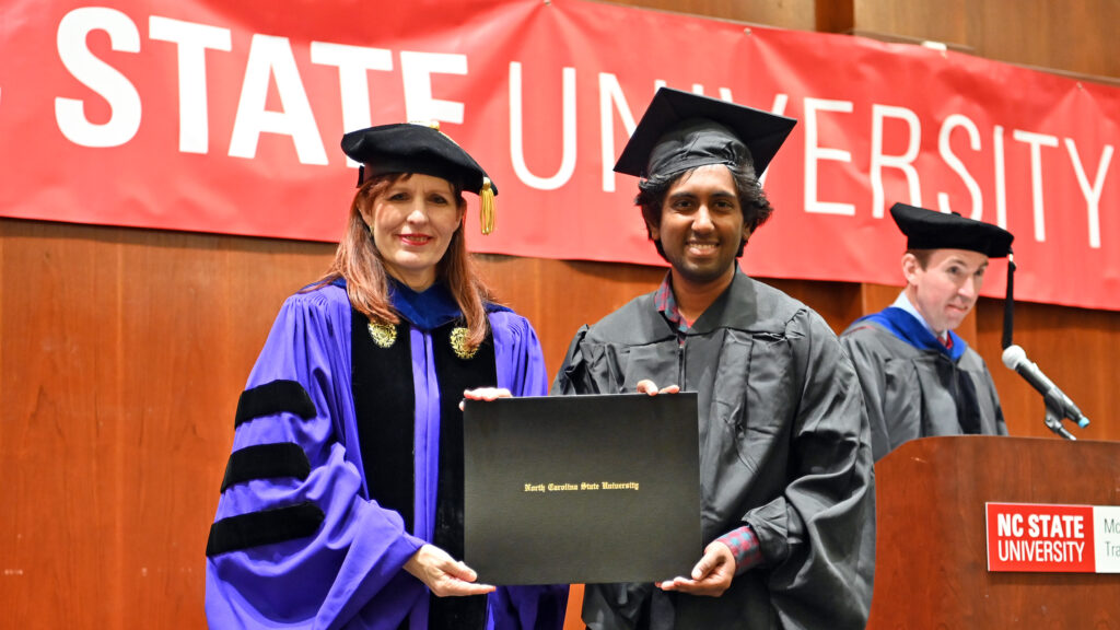 Gokul Muruganantham poses with Julie Swann and his degree
