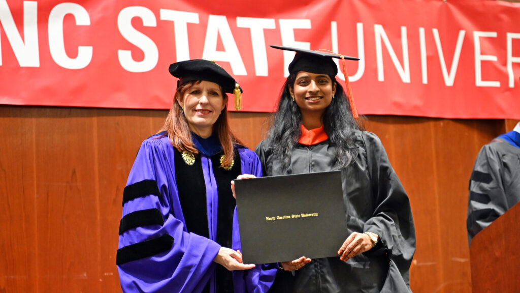 Alekhyaa Nelluri poses with Julie Swann and her degree