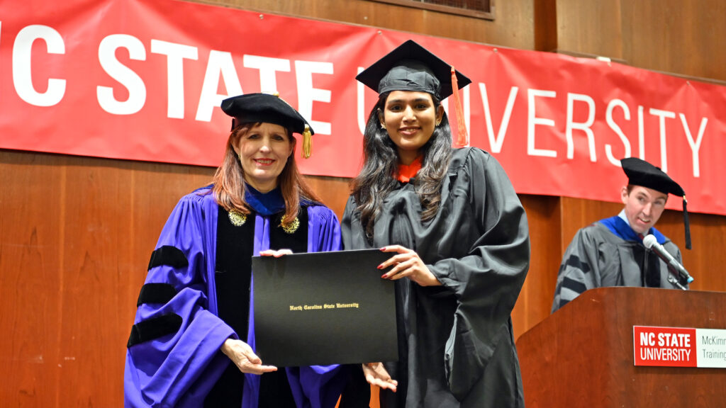 Hariyali Patel poses with Julie Swann and her degree